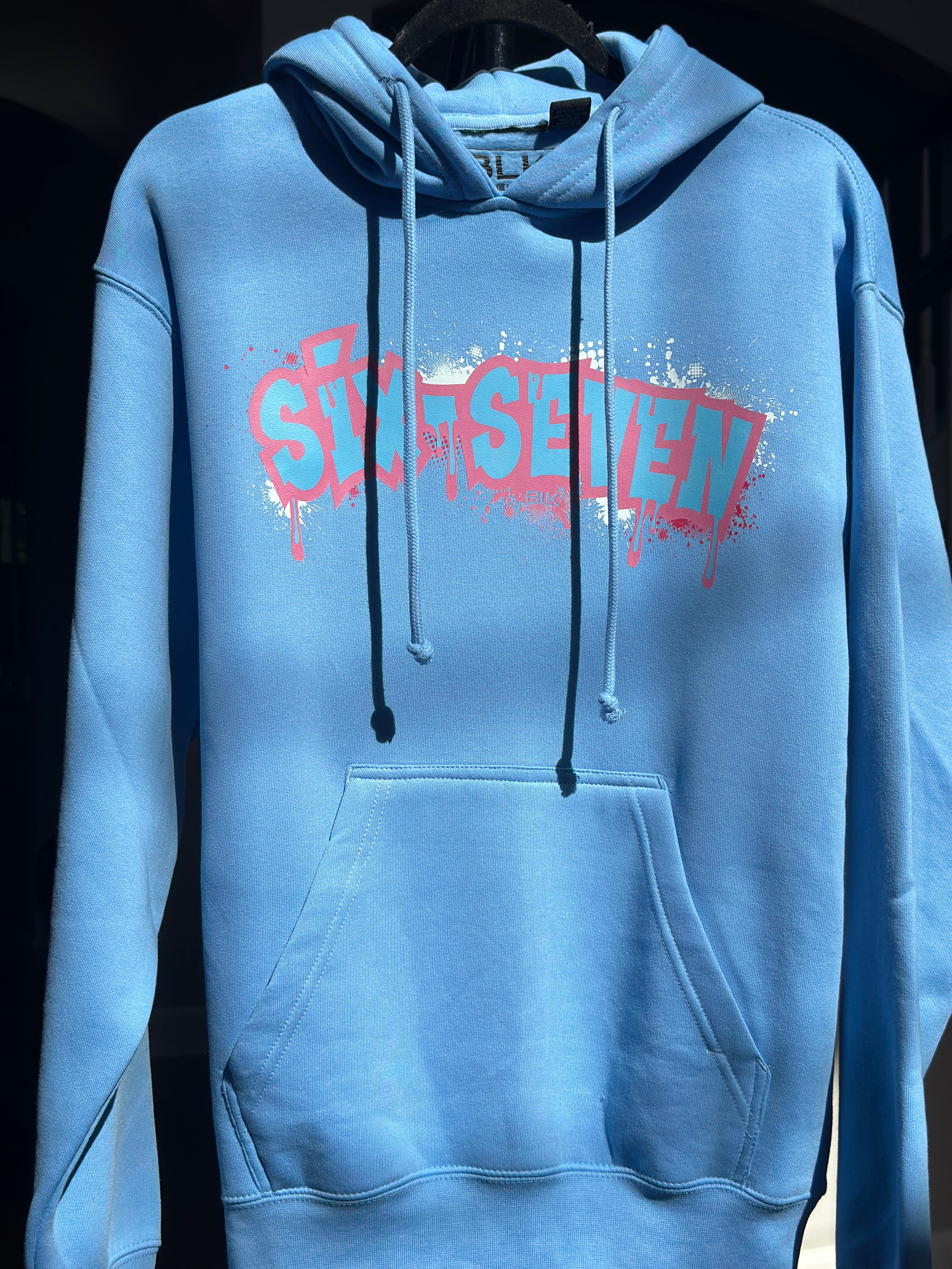 BLK the Label SIX-SEVEN Drip Hoodie in Vibrant Blue with Pink Graffiti