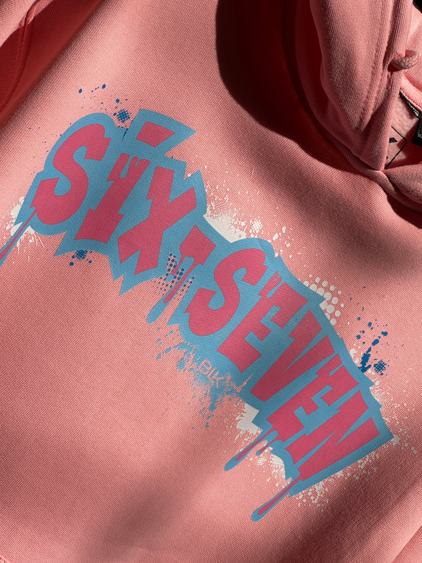 BLK the Label SIX-SEVEN Drip Hoodie in Vibrant Blue with Pink Graffiti Logo for Trendy 67 Comfort